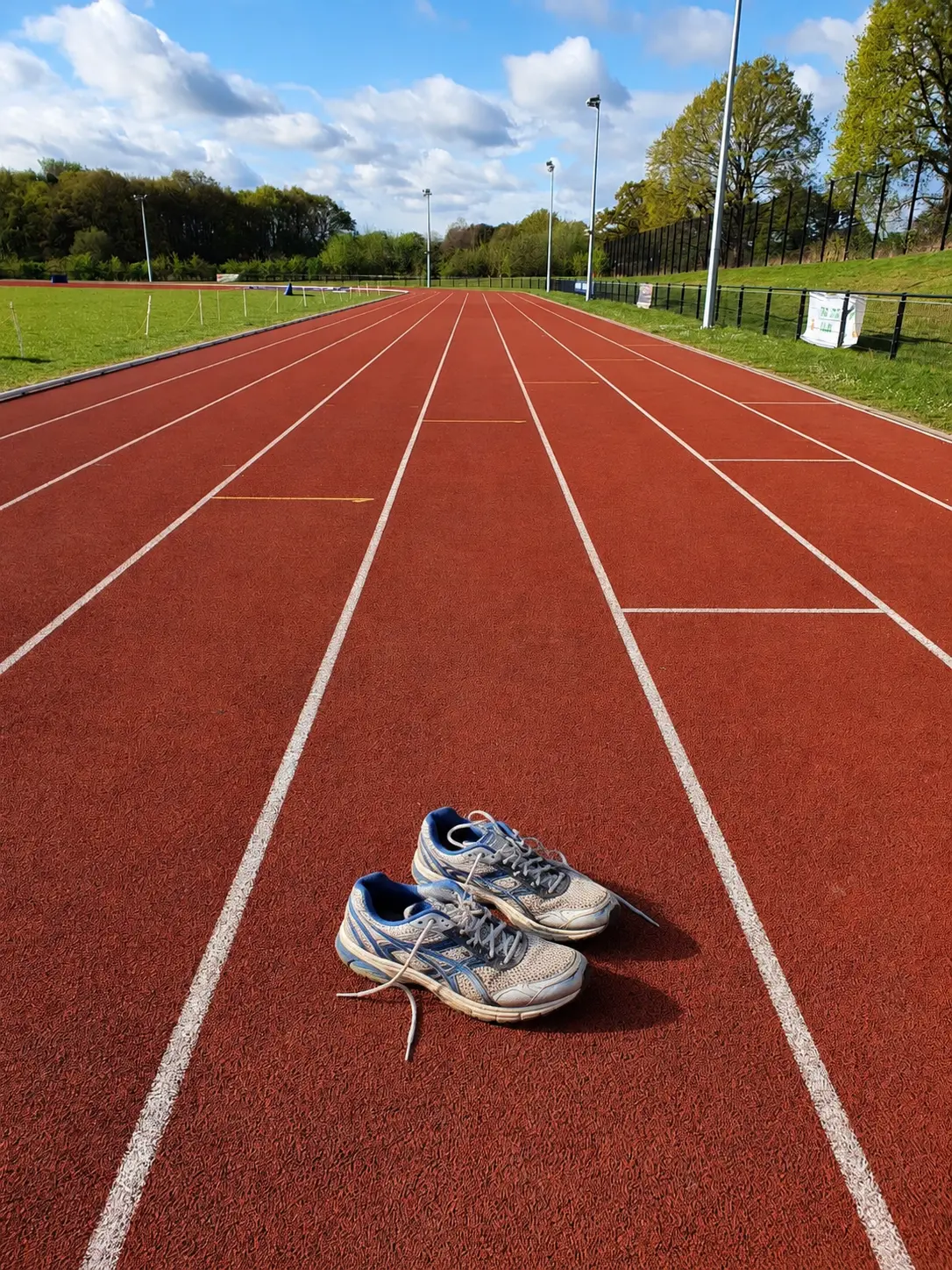 Empty Running track with trainers